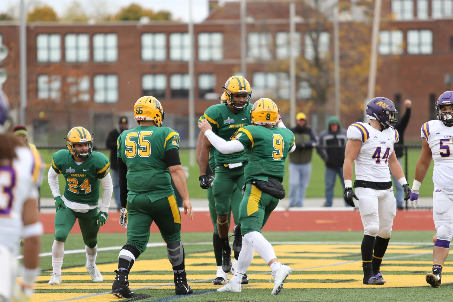 WR celebrating with teammates