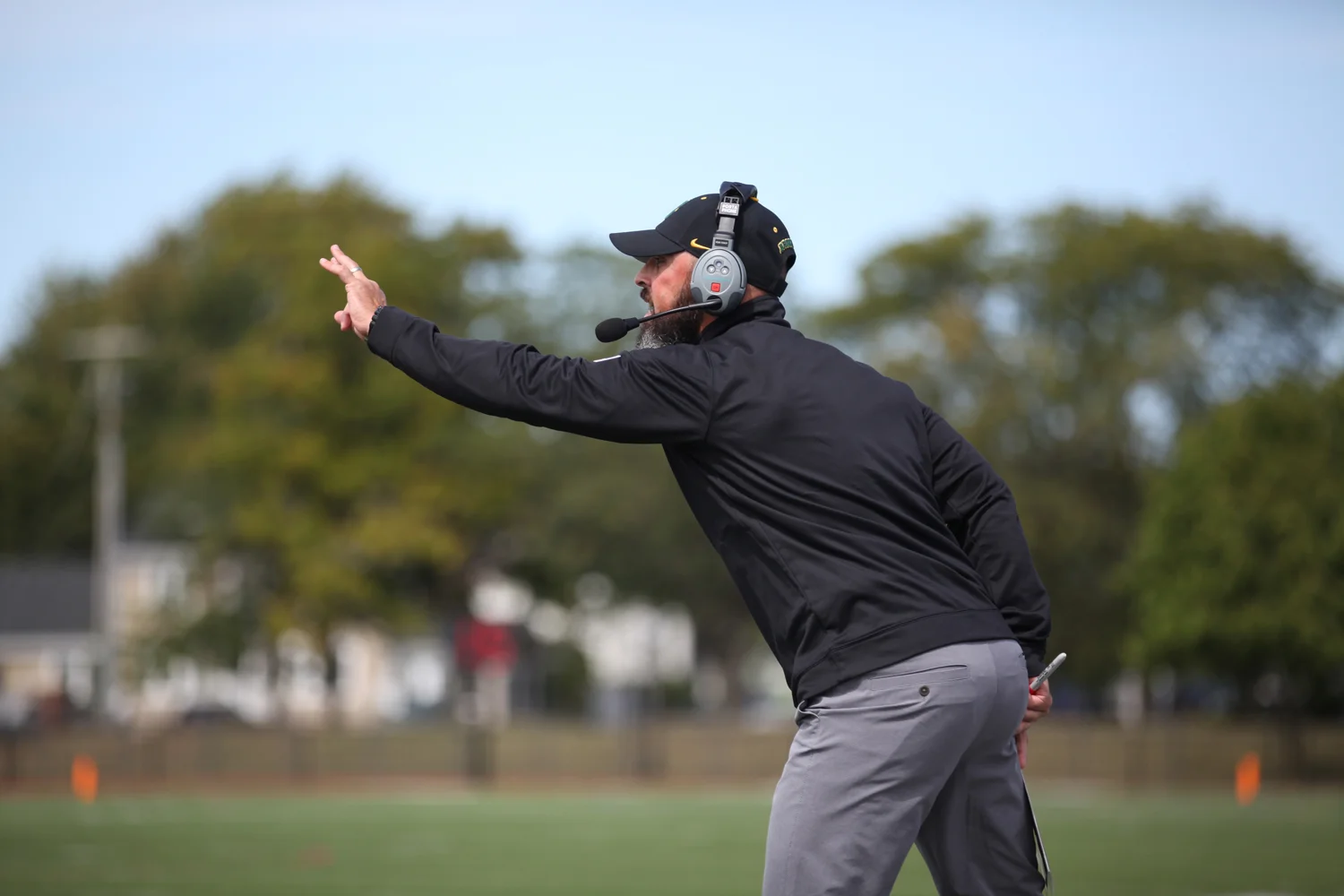 Coach Mangone giving signals