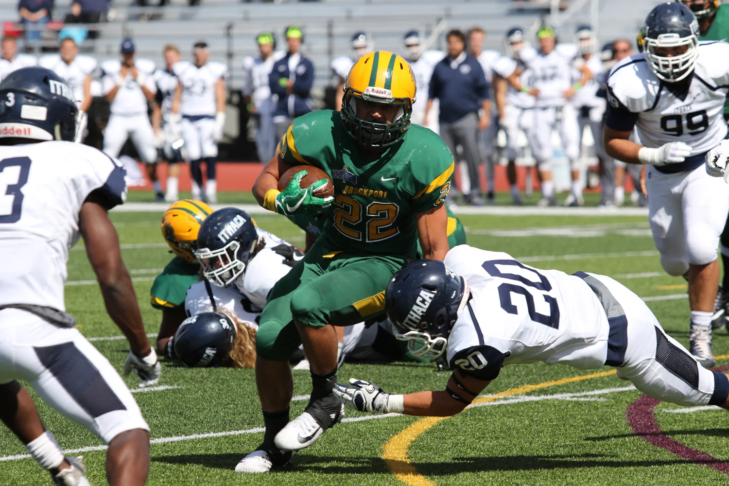 RB avoiding the defender and getting down field