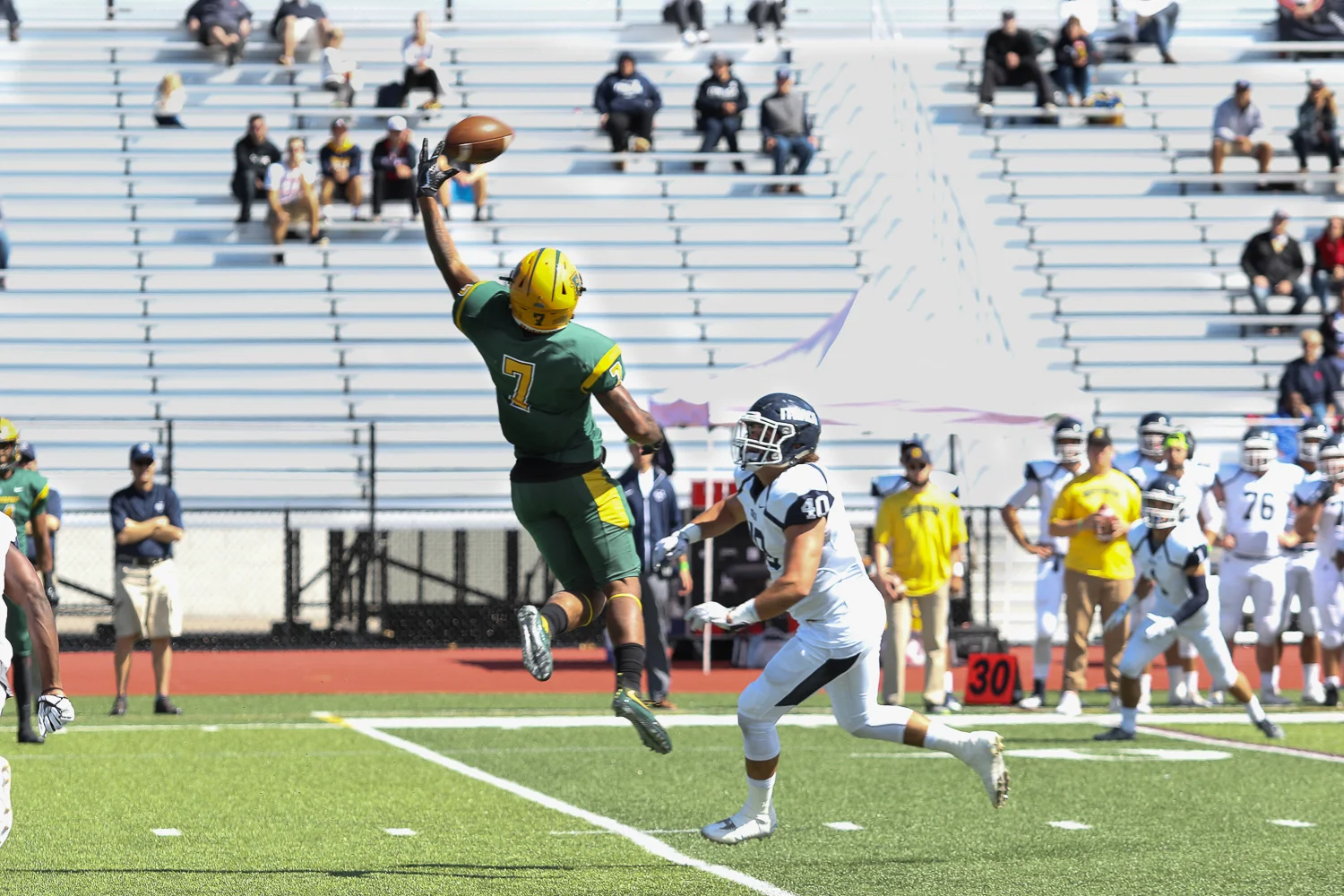 WR Going up for the catch