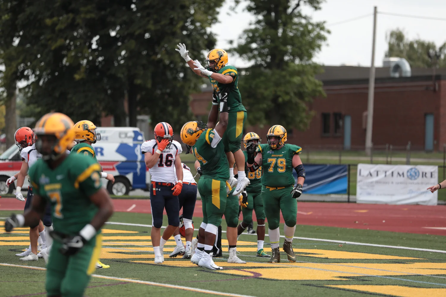 Brockport runs into the endzone and celebrates the score