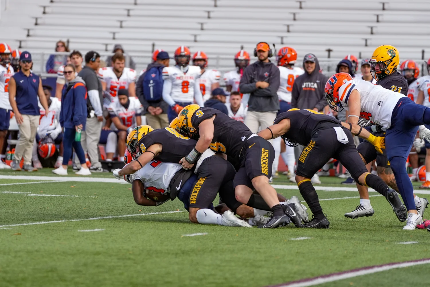 Brockport defense making the gang tackle