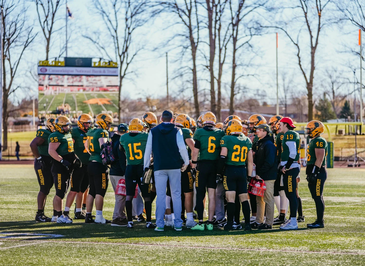 Brockport Huddle during a timeout on the field