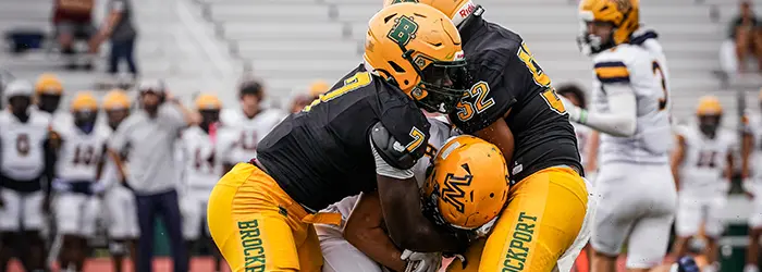 Brockport Golden Eagles making the tackle