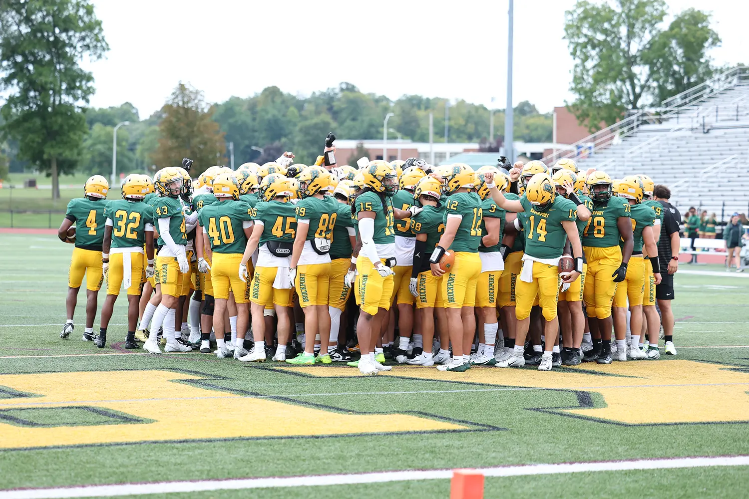 Brockport State Football Pregame huddle
