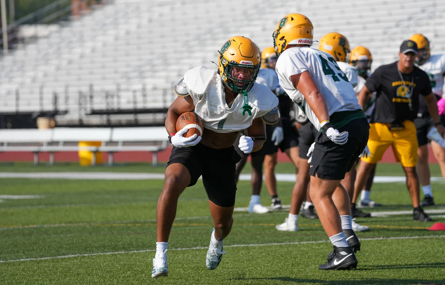 RB running the ball for Brockport