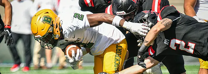 Brockport Running Back fighting the defense