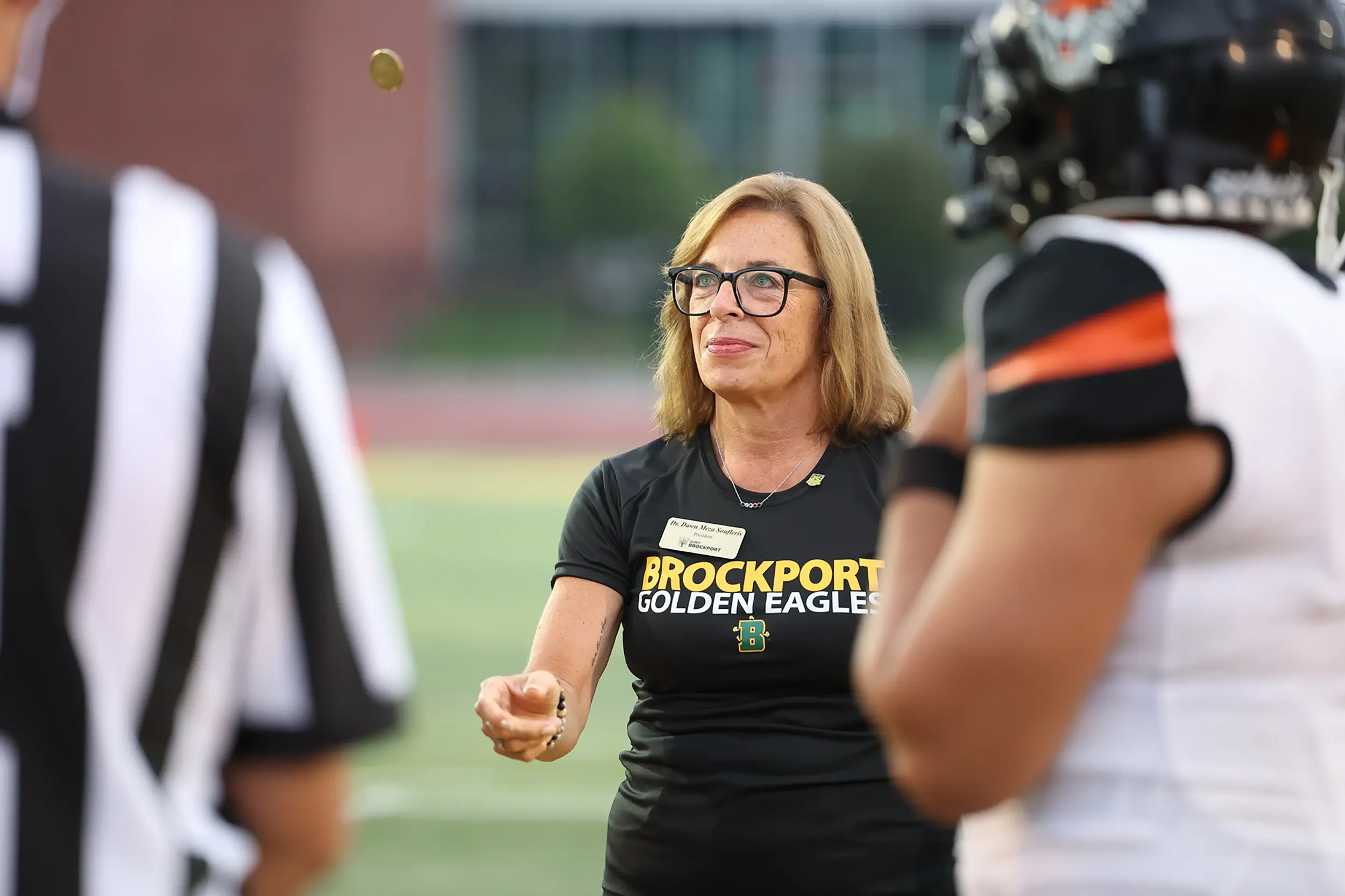 Brockport President with the cointoss