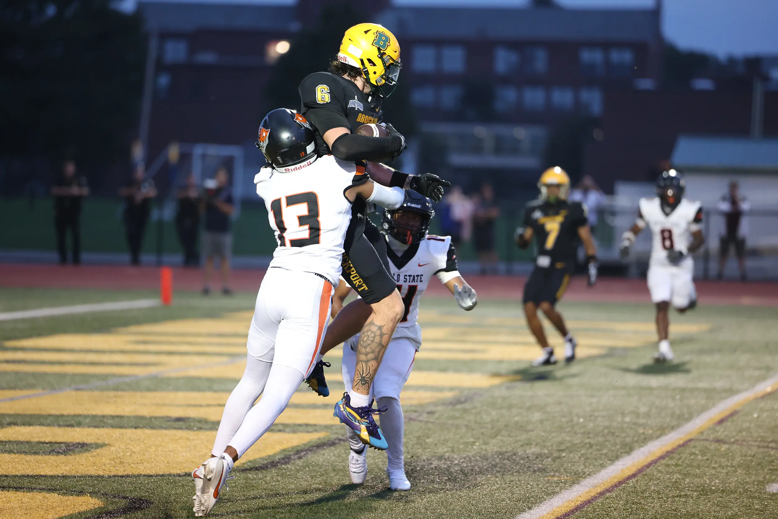 Brockport WR going up for the TD